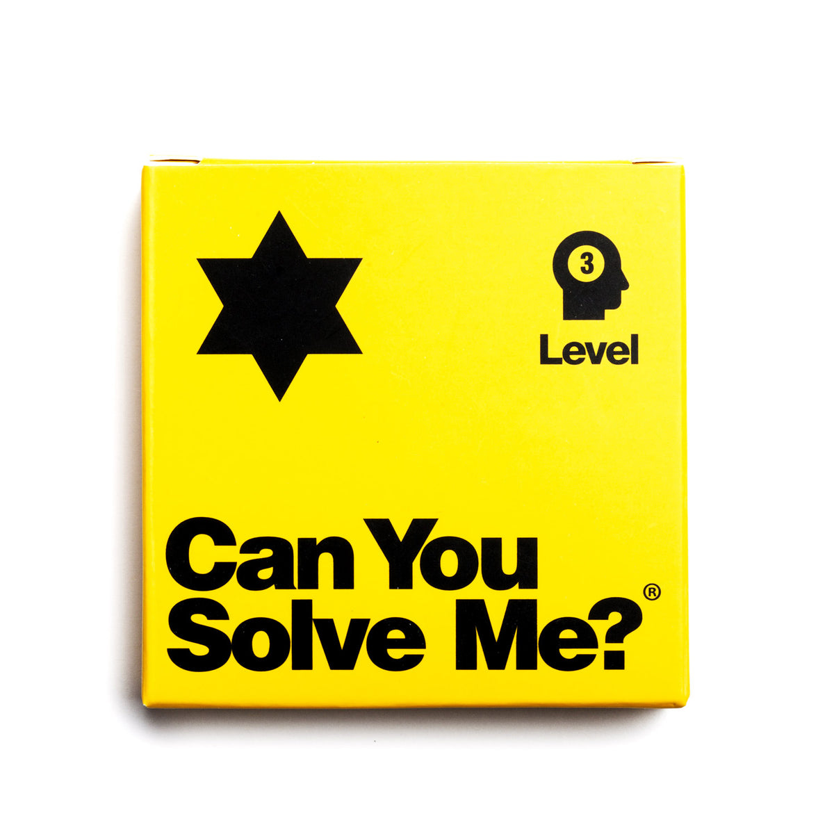 Star puzzle in its yellow retail packaging